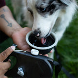 "Ultimate 4-in-1 Durable Retractable Dog Leash with Water Bottle and Bowl for Active Adventures!"