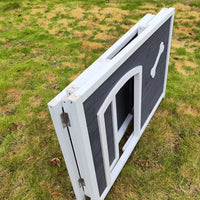 "Ultimate Weatherproof Dog House - Perfect for Dogs of Any Size!"